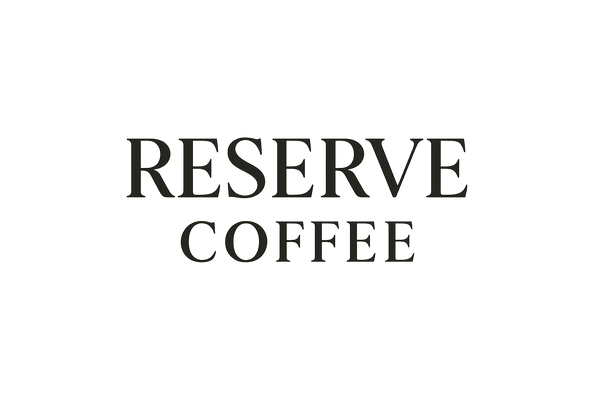 You are designing a logo for Reserve Coffee. Use a sophisticated serif typography, creating a luxury, clean aesthetic.